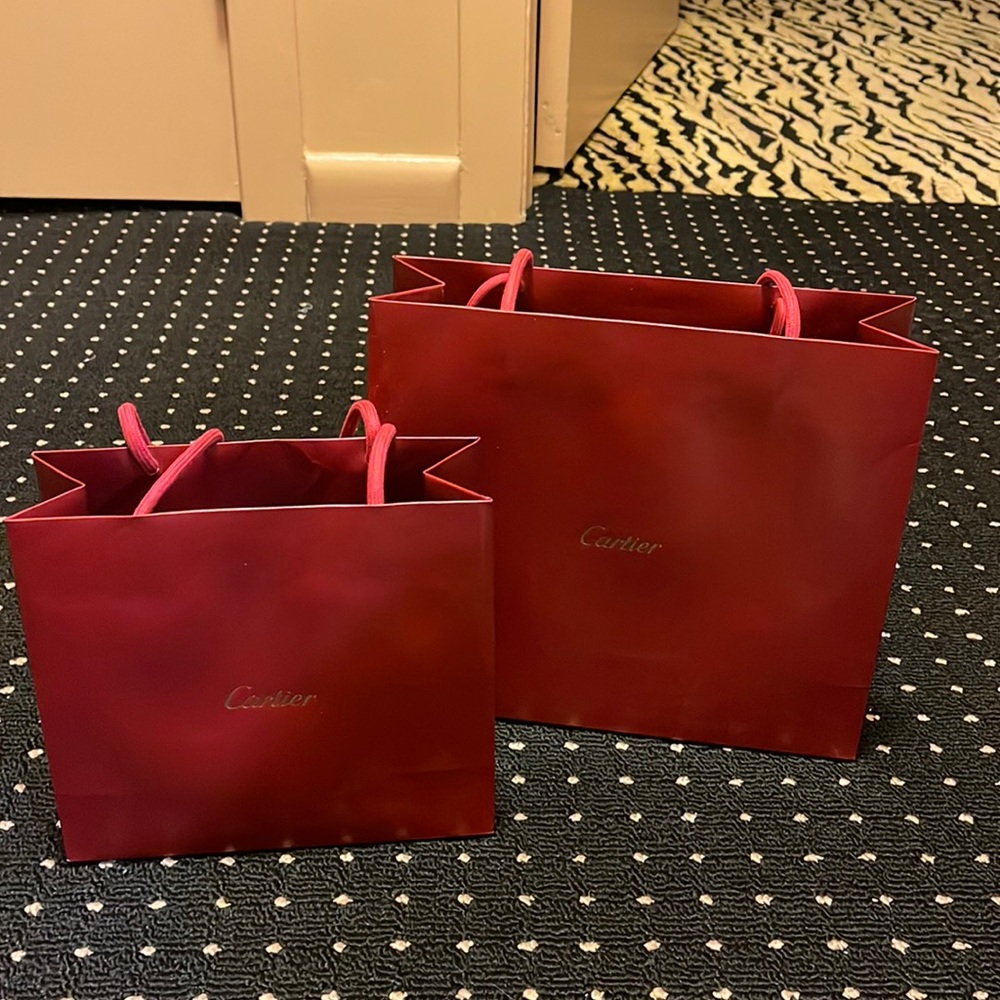 Small and medium cartier shopping bag. Very good condition